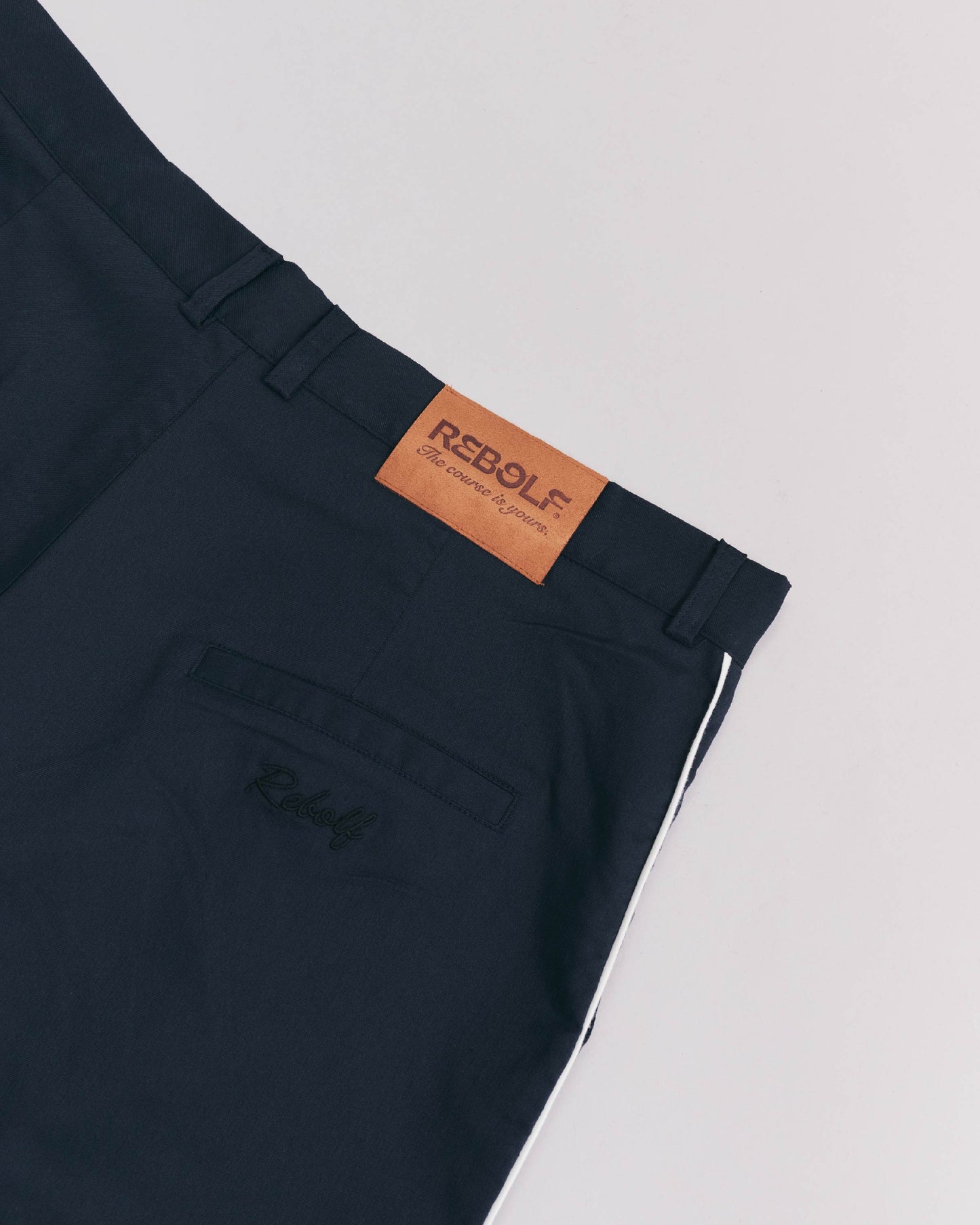 PLEATED NAVY PANTS