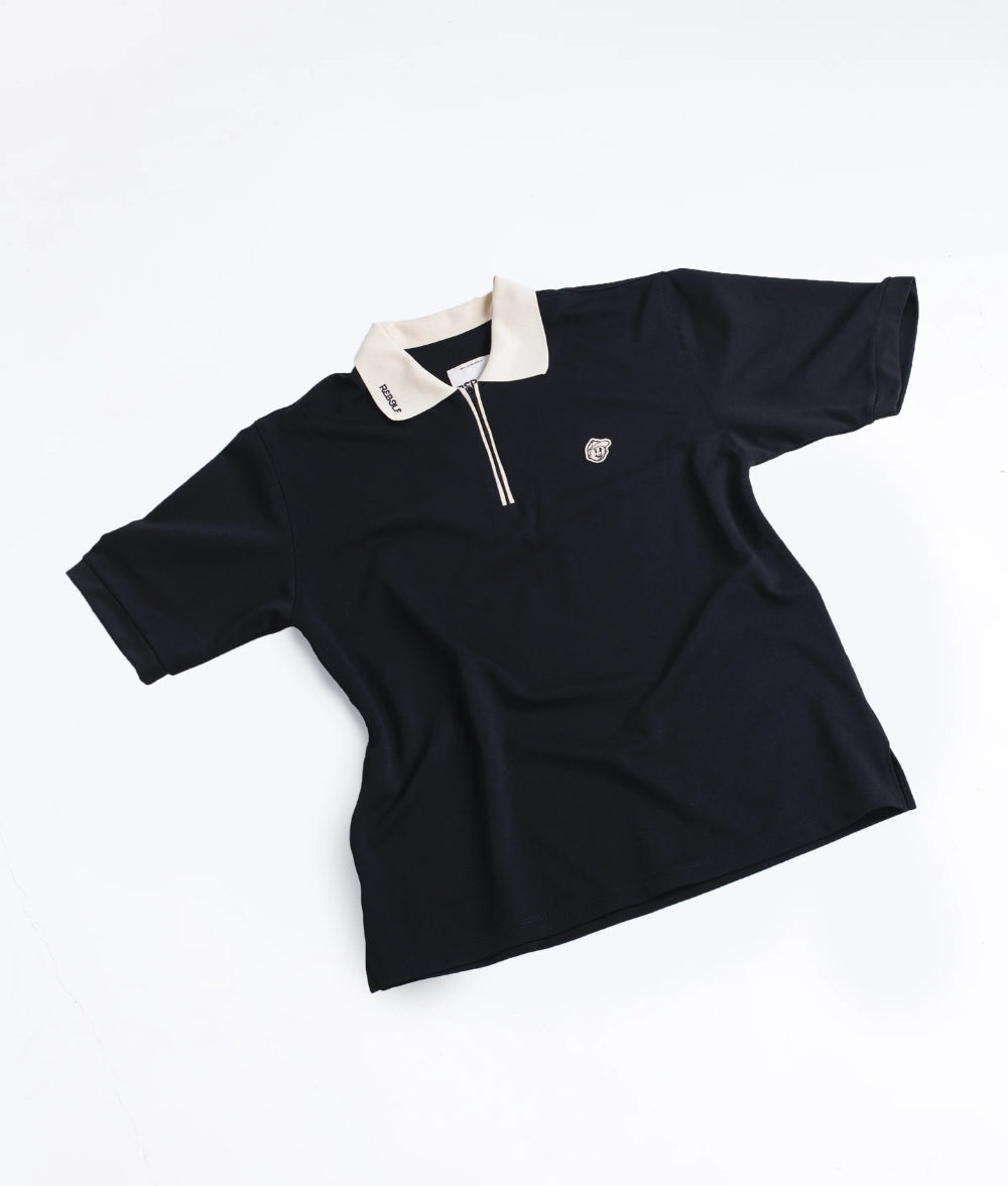 Polo negro con cremallera LE